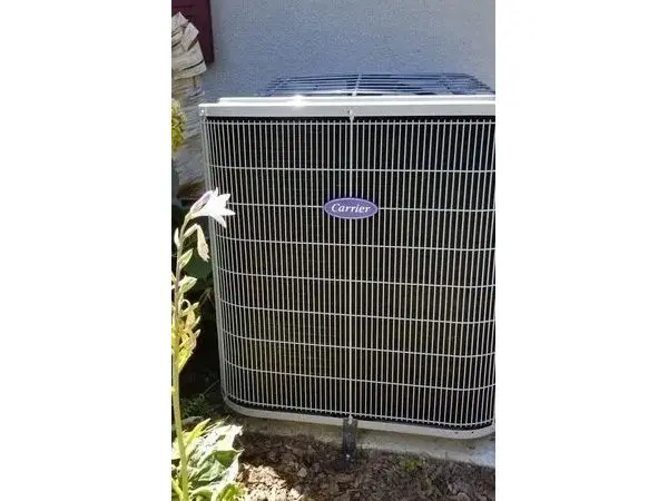 A picture of an air conditioner outside.